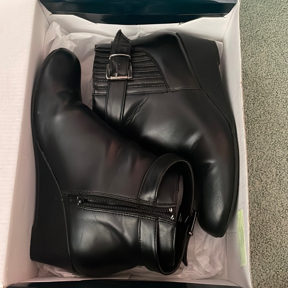 Black leather ankle wedge boots